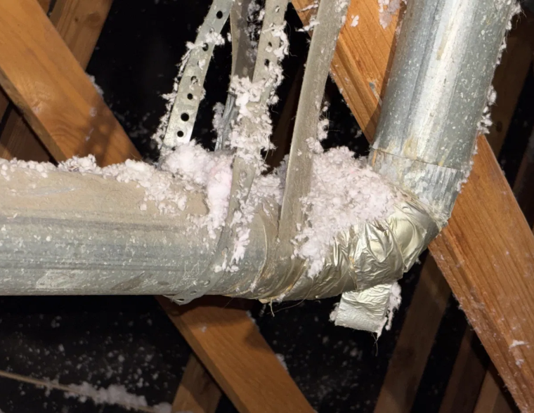 Dryer vent attic duct run foil tape elbow residential install San Antonio Texas
